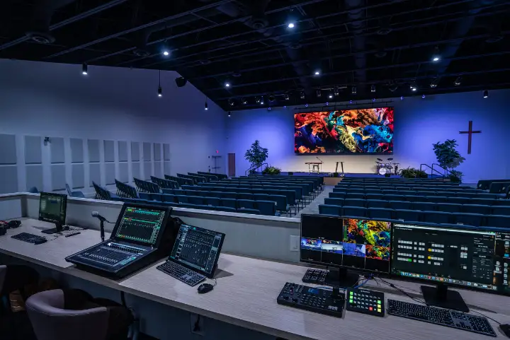 Modern church interior with audiovisual production equipment