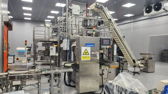 Food packaging machinery on a clean production floor
